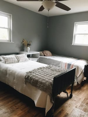 Two twin beds in a cozy resident room