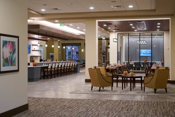 Interior dining area with tables and chairs