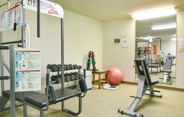 Well-equipped exercise room with gym equipment