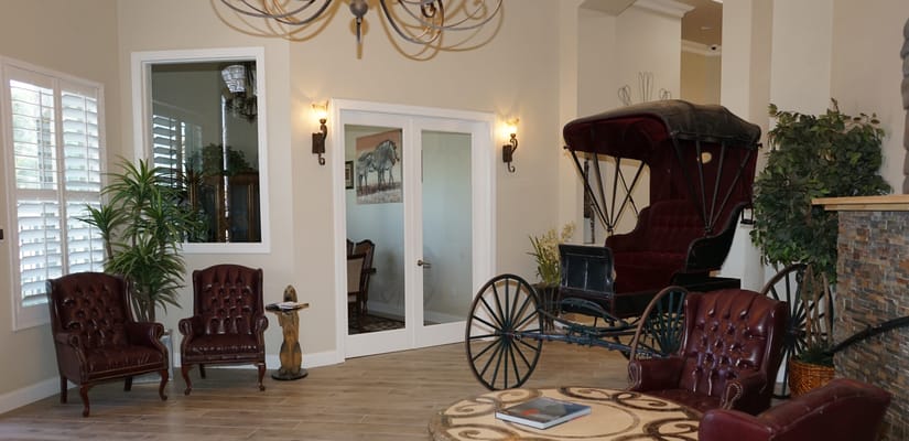 Interior view of a lobby with vintage decor and seating