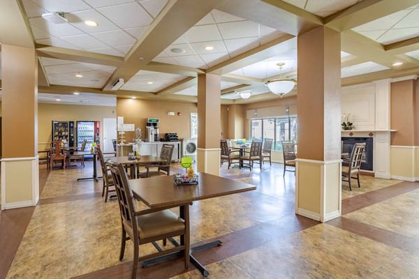 A cozy dining area in an assisted living facility.
