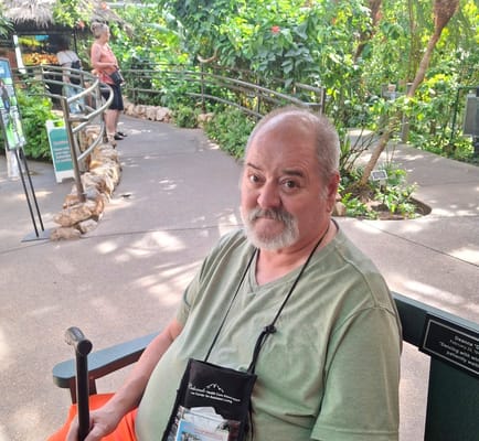 Resident enjoying the outdoor garden space