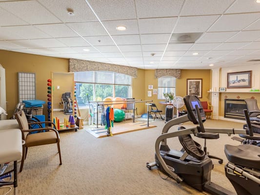 Therapy room with exercise equipment and therapy bar
