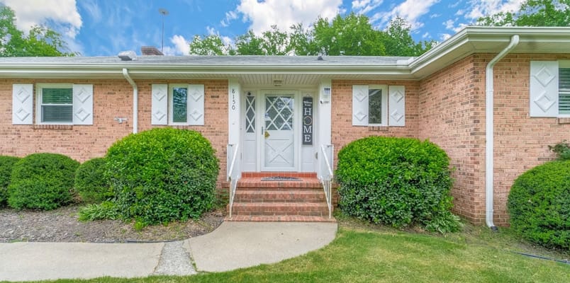 Exterior view of a single-story senior living facility entrance