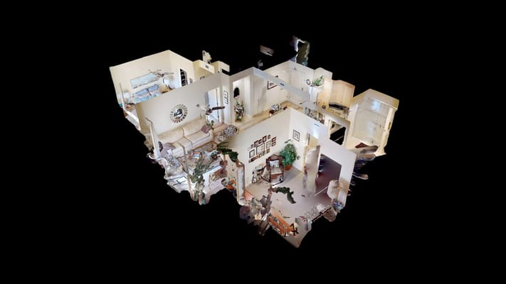 3D view of an apartment interior showcasing living spaces