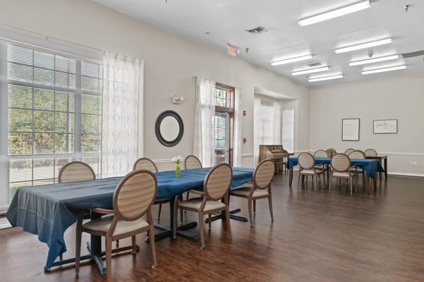Interior dining room setup with tables and chairs