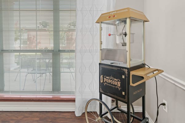 Vintage popcorn machine in a bright common area