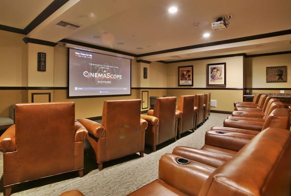 Interior view of a cozy movie theater with seating