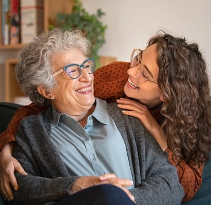 Two women enjoying a happy moment together