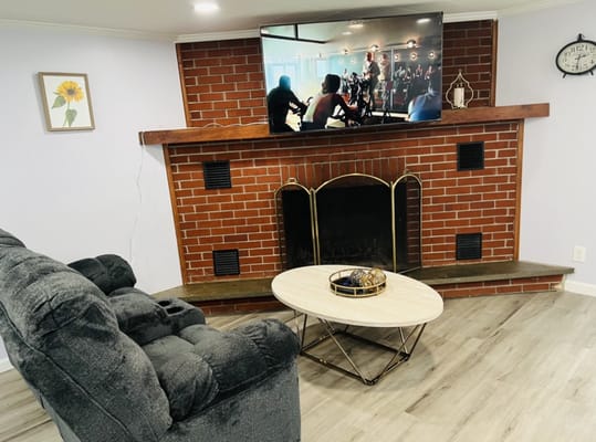 Cozy common area with a television and seating