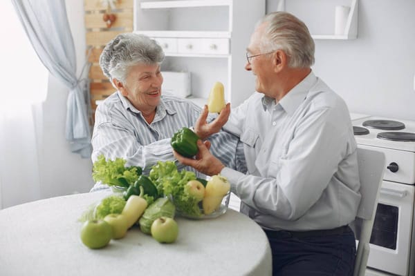 Residents enjoying time together while cooking