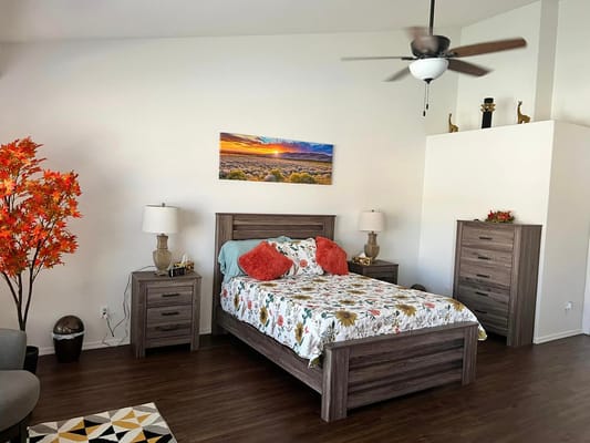 Cozy, well-decorated private bedroom in assisted living facility