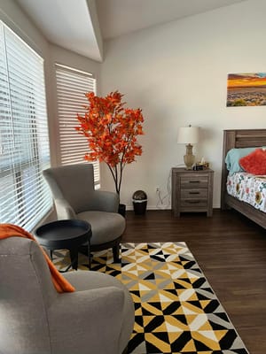 Cozy resident room with stylish decor and furniture