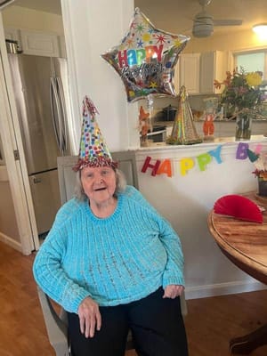 A resident celebrating their birthday with decorations