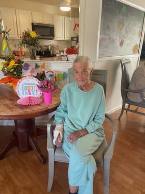 Resident celebrating a birthday in a common area