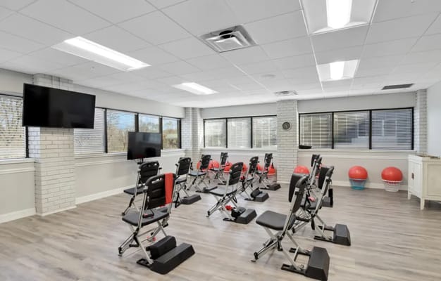 Activity room with exercise equipment and fitness balls