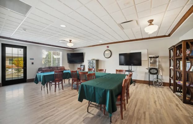Interior view of a common area with tables and chairs