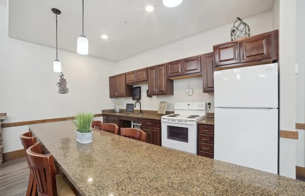 Bright communal kitchen area with seating