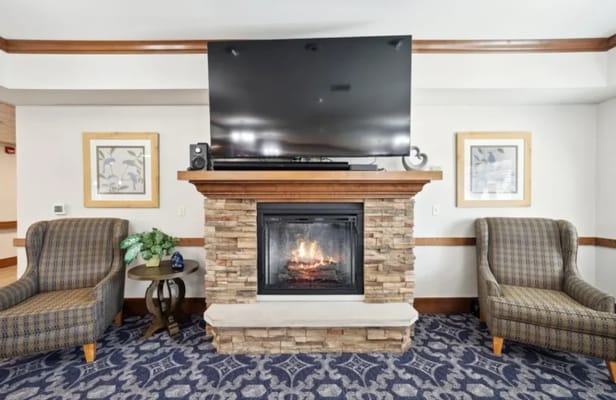 Cozy interior living space with fireplace and seating