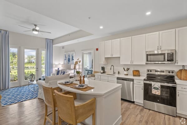 Bright interior of an assisted living kitchen and living space