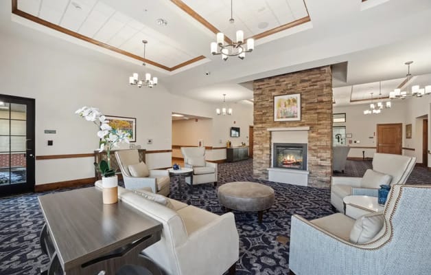 Comfortable lounge area with a fireplace and seating