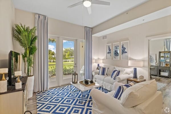 Bright common area with comfortable seating and natural light