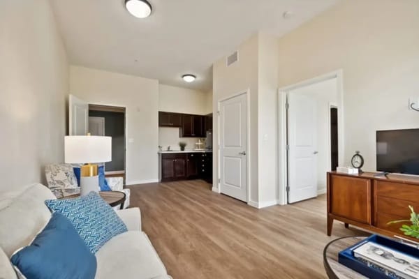 Bright interior of a resident's room with furniture