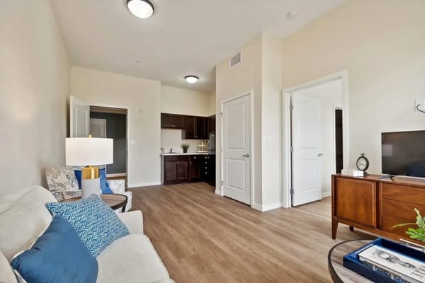 Bright interior of a resident's room with furniture