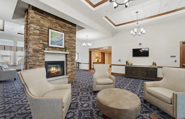 Cozy common area with seating and fireplace