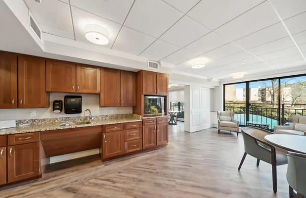 Bright common area with modern kitchen and seating
