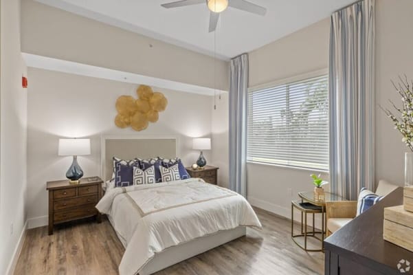 Brightly decorated private resident room with natural light
