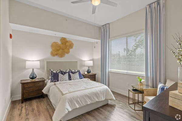 Brightly decorated private resident room with natural light