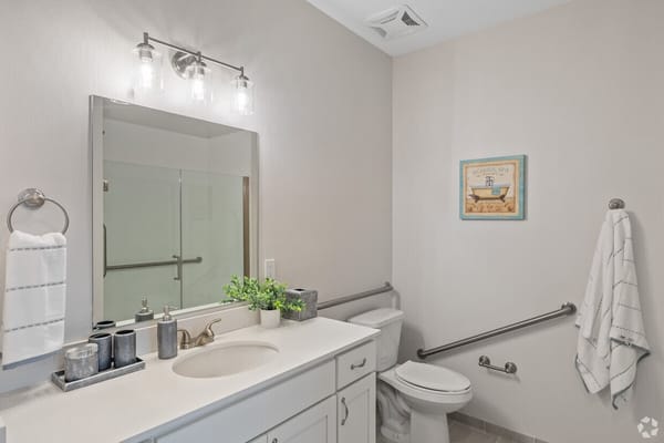 Bright bathroom with modern fixtures and decor