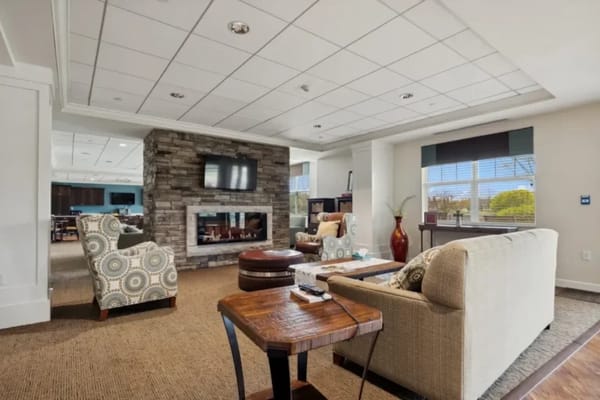 Comfortable lounge area with seating and fireplace