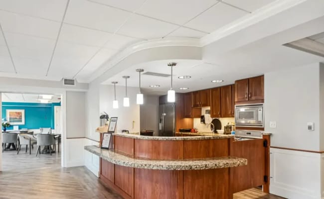 Bright common area with wooden reception desk