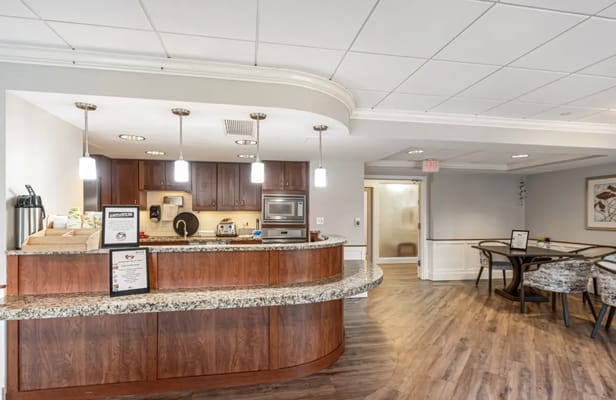 Interior view of a common area and kitchen space