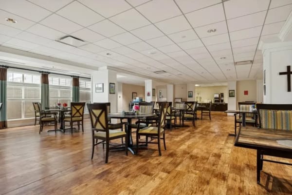 Interior dining area with tables and chairs