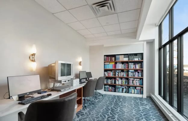 Bright interior of a library area with computers