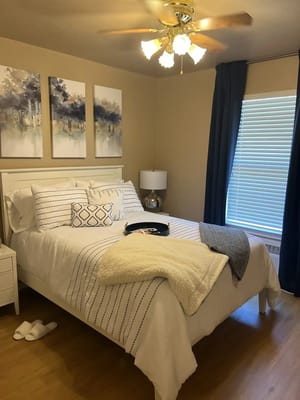 Cozy bedroom with a comfortable bed and decor