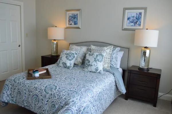 Cozy bedroom with elegant decor and bedding