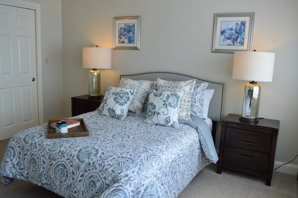 Cozy bedroom with elegant decor and bedding