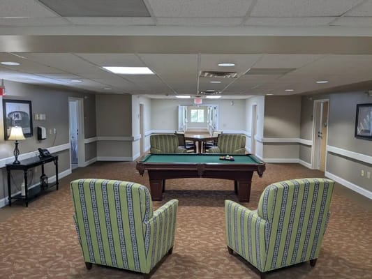 Common area with pool table and seating