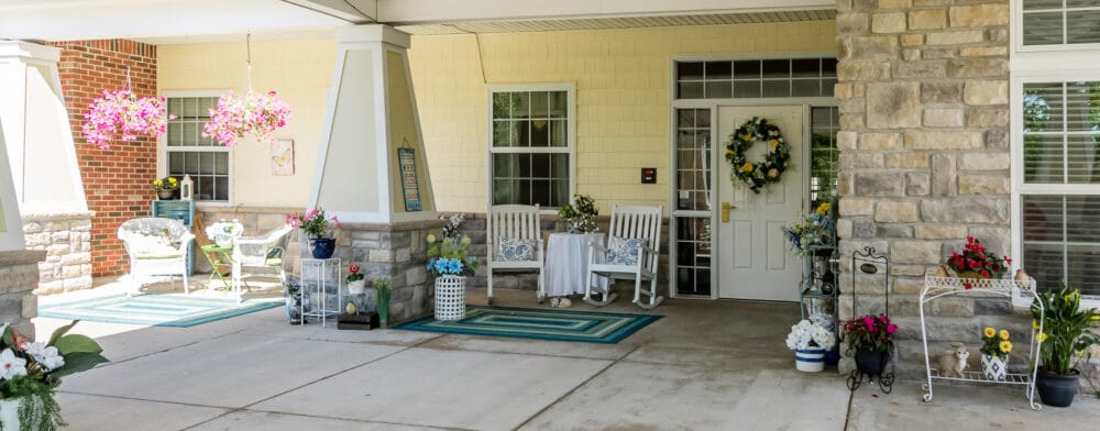 Outdoor seating area with flowers and decorations