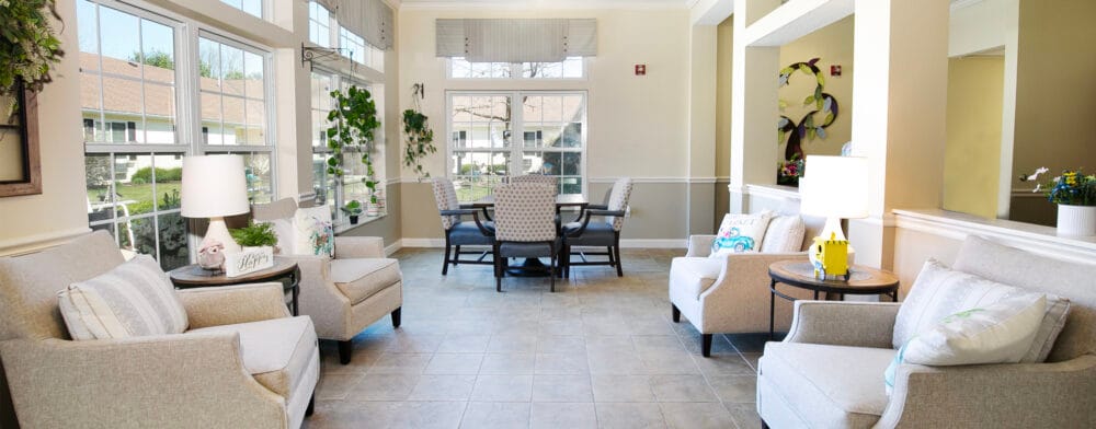 Bright common area with seating and natural light