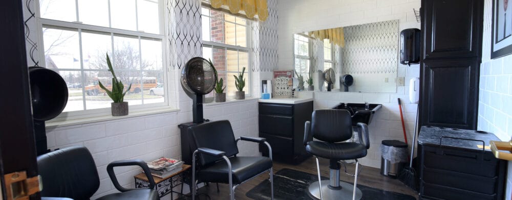 Interior view of a beauty salon with styling chairs