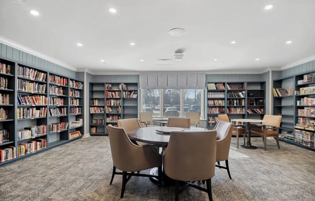 Bright and spacious library with bookshelves and seating