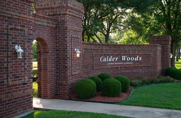 Brick entrance sign for Calder Woods community