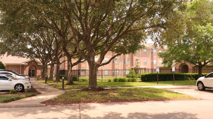 Exterior view of Buckner Parkway Place surrounded by trees