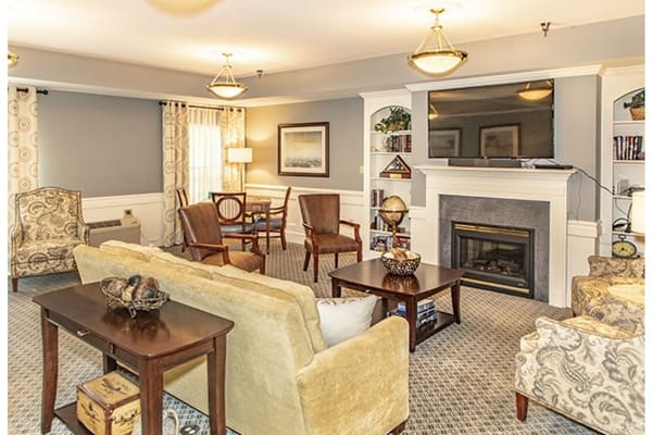 Cozy common area with seating and fireplace