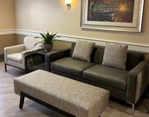 Cozy lounge area with seating and decor